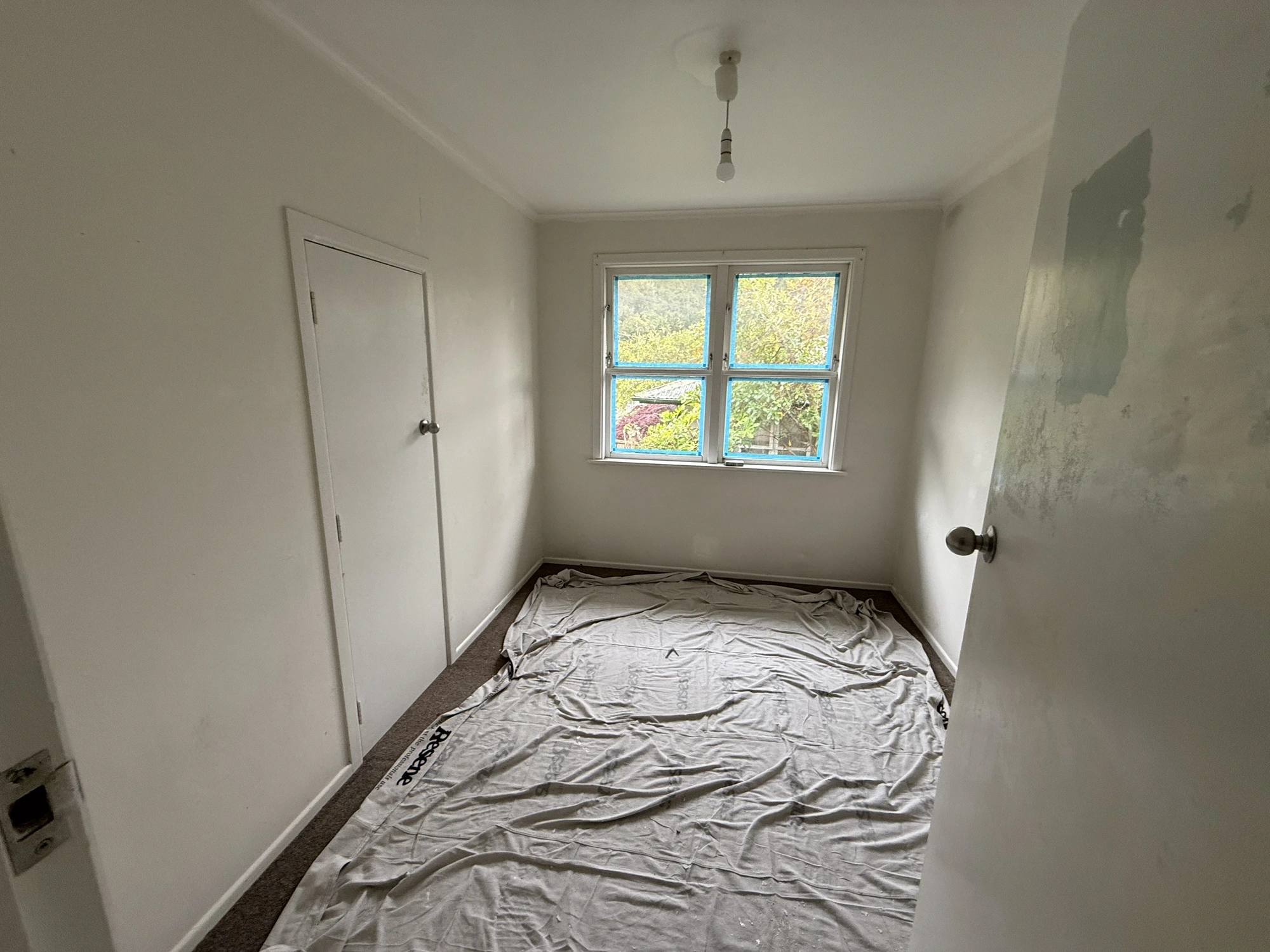 During stage room section during active surface prep and paintwork